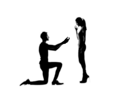 young Asian man propose to his girlfriend, silhouette